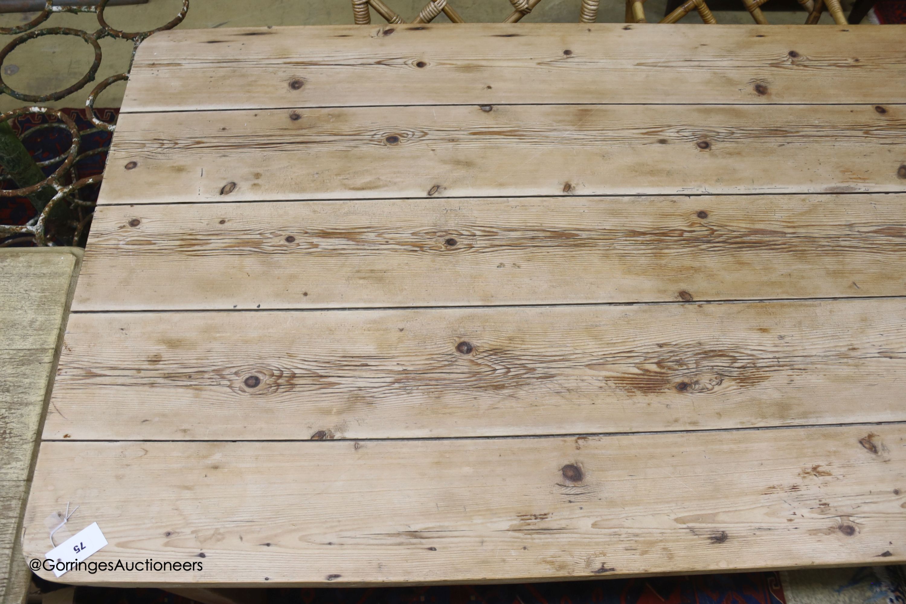 A 19th century rectangular pine plank top farmhouse kitchen table, length 211cm, depth 98cm, height 75cm